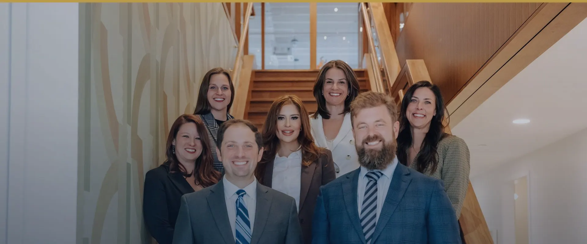 The Conduit Law team on the stairs of the Denver office